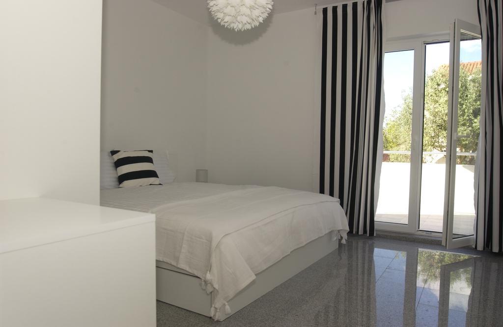 Apartamento Casa Vito Nin Habitación foto